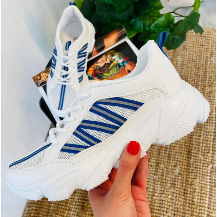 Balti sporta apavi ar ziliem akcentiem