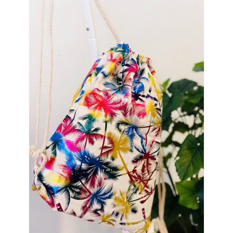 Mugursoma ar krāsainām palmām