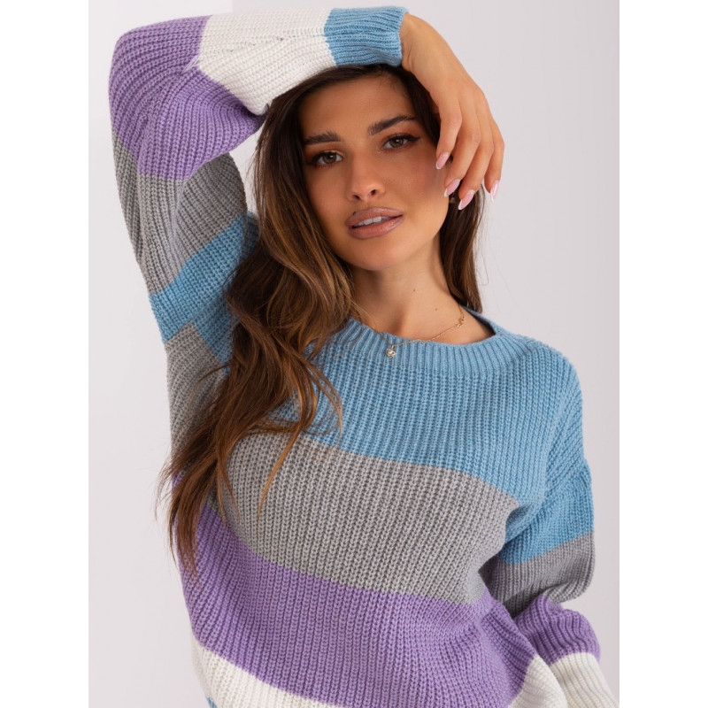   Brīva piegriezuma džemperis ar krāsainām  strīpām